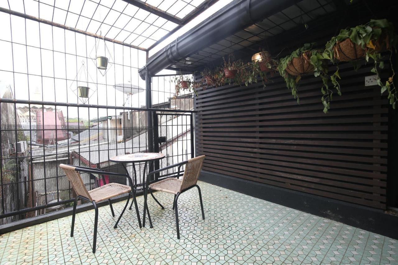 Spot On 90141 Threehouse Bed & Breakfast Kuching Bagian luar foto